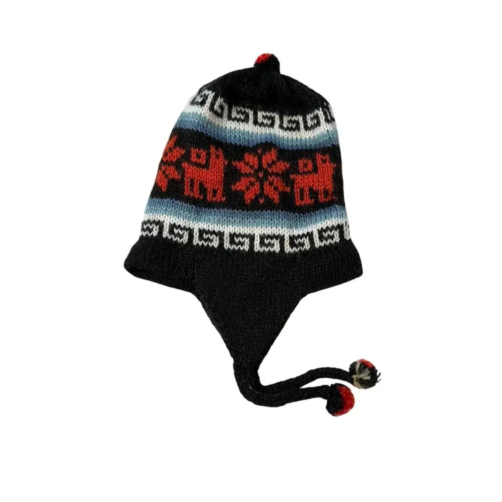 Handmade baby chullo alpaca hat from Peru. beanie, winter hat, tassels, knit cap